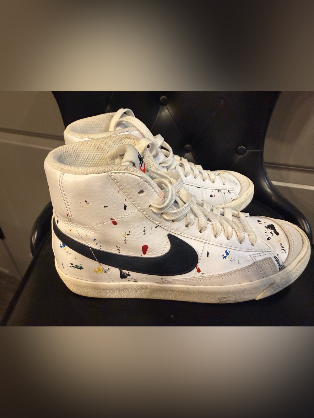 Nike White High-Top Sneakers with Black Swoosh and Paint Splatter